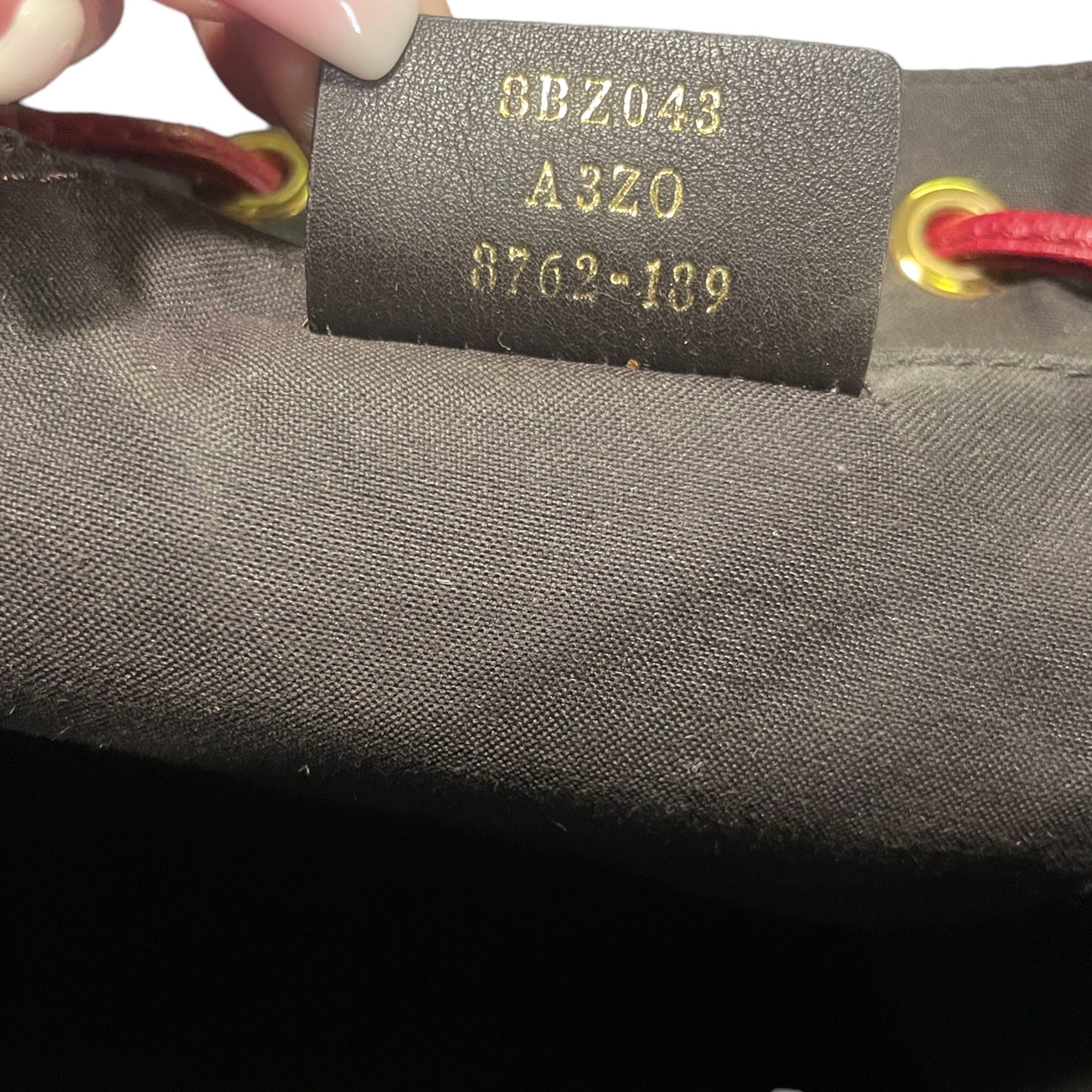 Fendi Drawstring Flap Backpack Leather with Zucca Embossed Detail