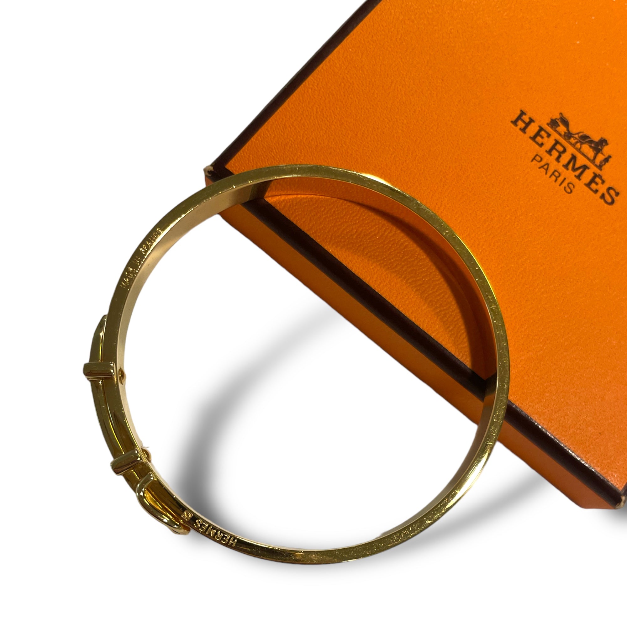 HERMÈS ORANGE Thin Slim Gold "Belt Buckle" Motif Bangle