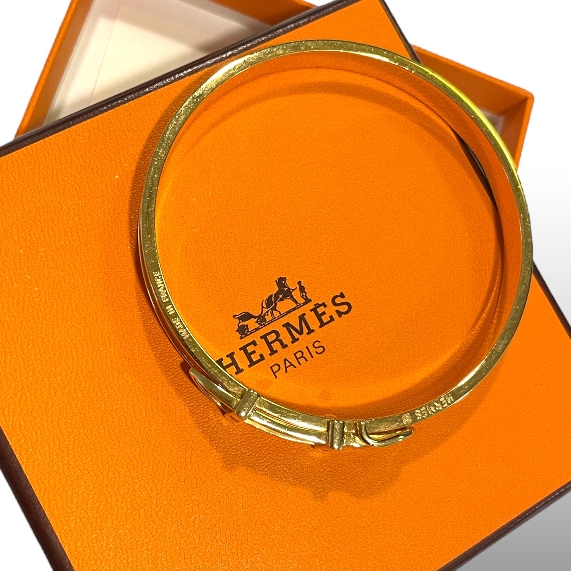 HERMÈS ORANGE Thin Slim Gold "Belt Buckle" Motif Bangle