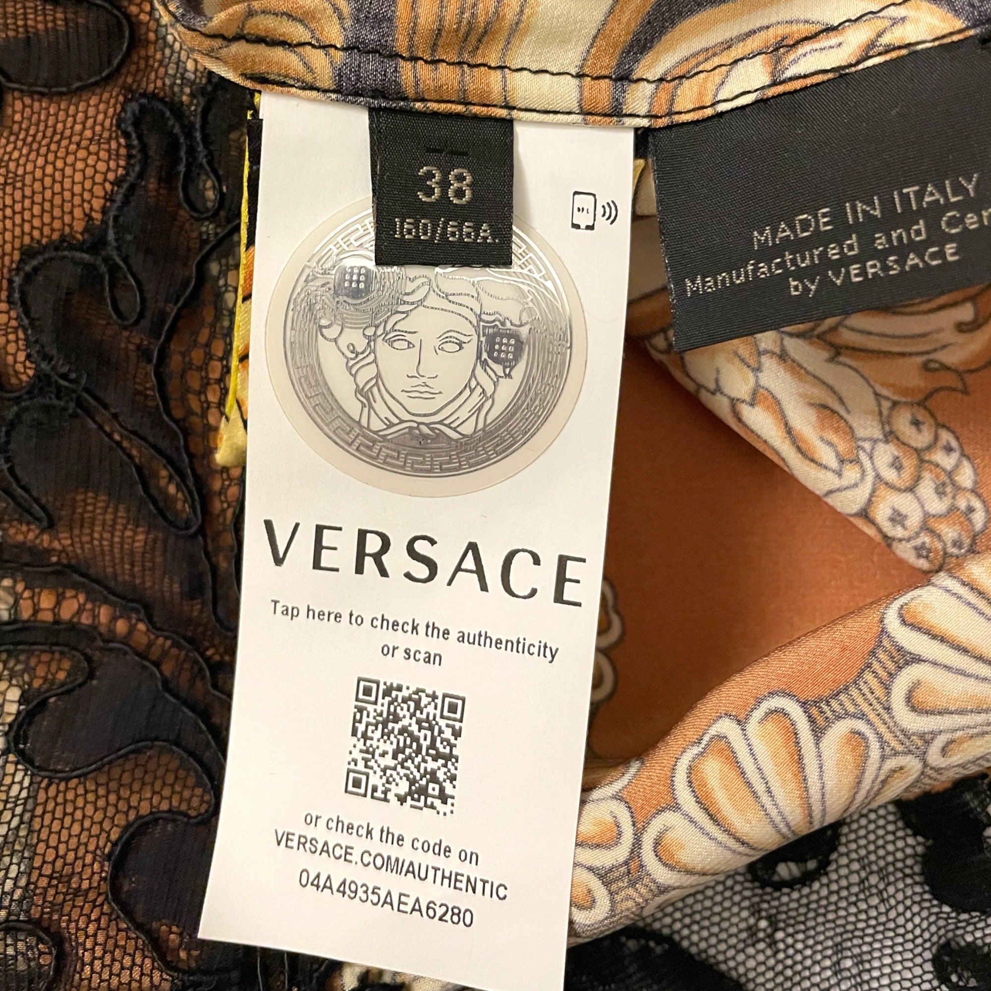 VERSACE Silk Knee-Length Skirt
| Size: XS | US2, IT38 |