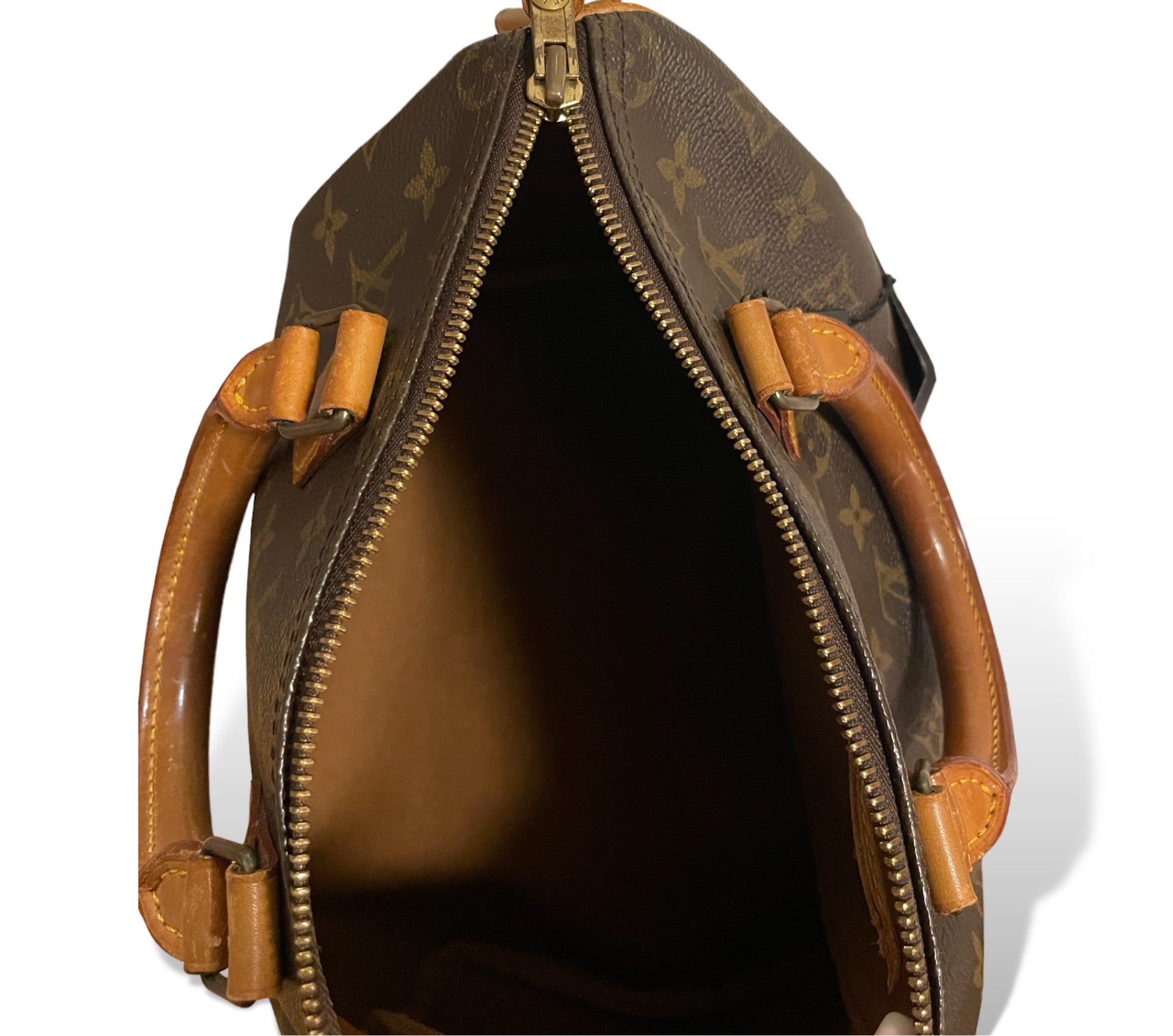 Louis Vuitton Vintage Speedy 25 handbag in iconic Monogram coated canvas & Vachetta leather trim
