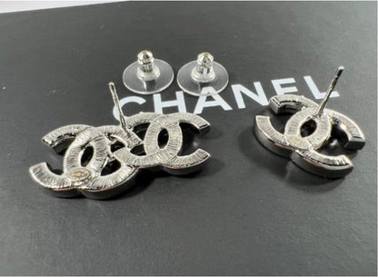 Chanel Silver interlocking CC Logo and Baguette Crystal Stud Earrings - photo 4 of 11