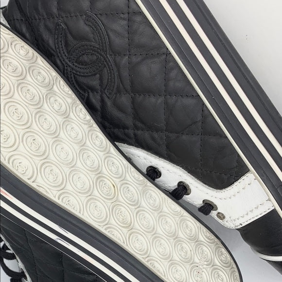 CHANEL Quilted Leather Sneakers