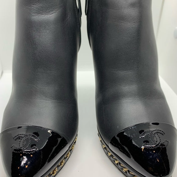 CHANEL Black Ankle Boot Gold Braided Chain Sole