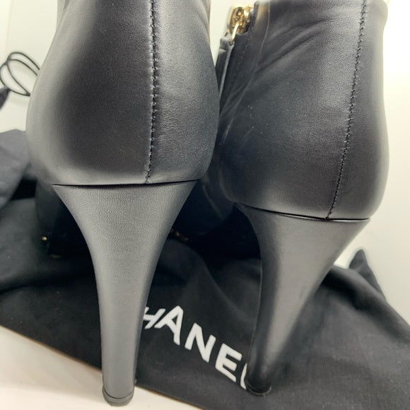CHANEL Black Ankle Boot Gold Braided Chain Sole