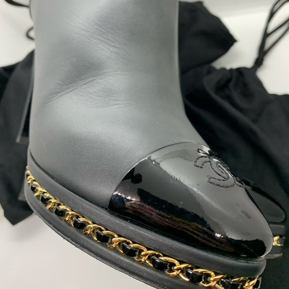 CHANEL Black Ankle Boot Gold Braided Chain Sole