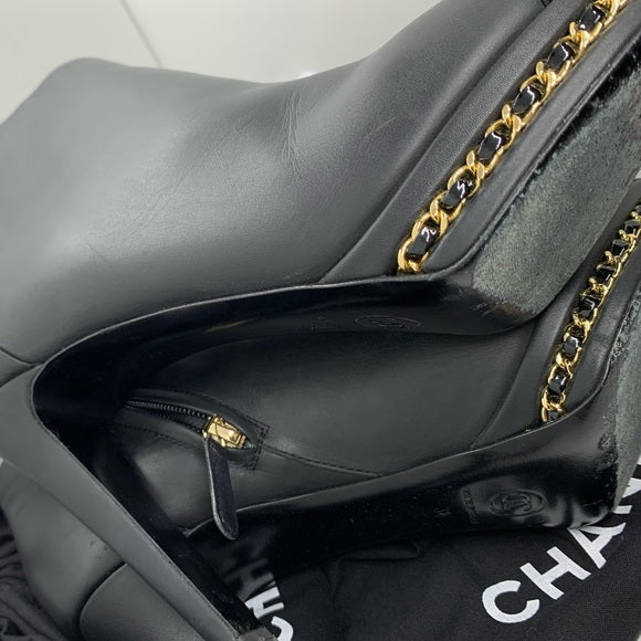 CHANEL Black Ankle Boot Gold Braided Chain Sole