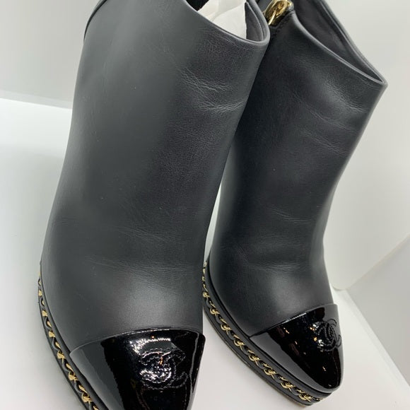 CHANEL Black Ankle Boot Gold Braided Chain Sole