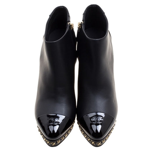 CHANEL Black Ankle Boot Gold Braided Chain Sole